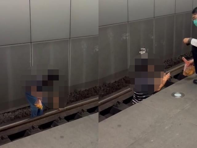 高雄市一名婦人今早被發現走在高雄火車站的軌道上，被月台清潔人員發現後緊急通報車站行車室，當時月台號誌燈已經亮起，列車隨即進站。記者宋原彰／翻攝